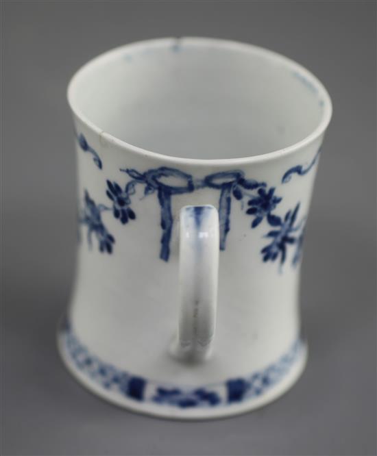 A very rare Worcester blue and white Floral Swag, Ribbon and Scroll pattern coffee can, c.1755, two rim chips with short hairline crack
